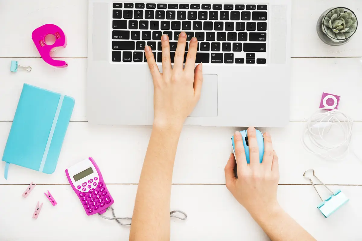 Flat lay of office desk during work hours