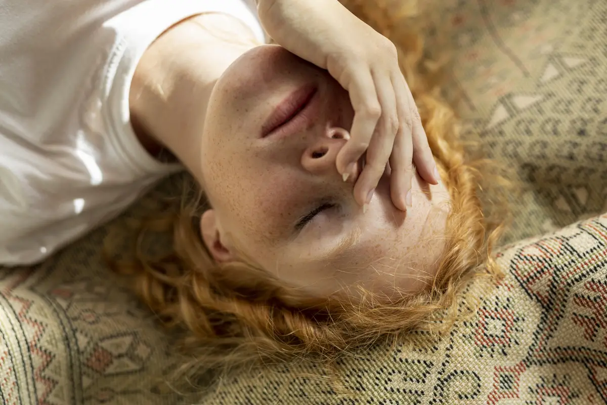 Close-up girl covering her face 