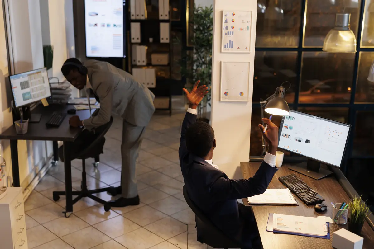 Nervous businessman trying to solve company investment failure