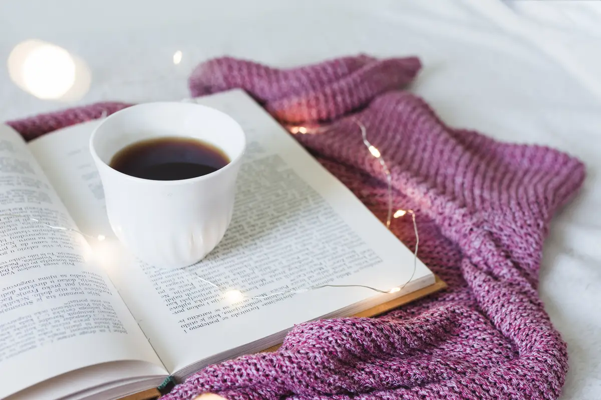 Breakfast in bed with a book