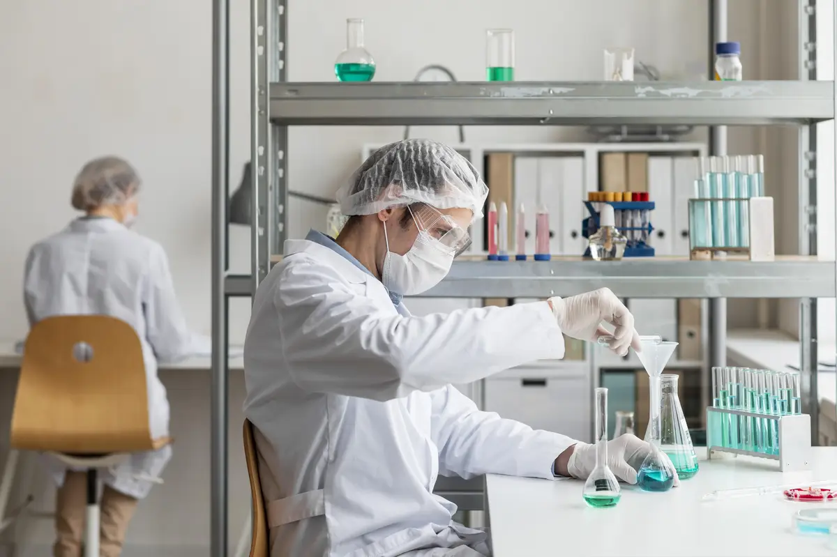 Medium shot scientist preparing solution