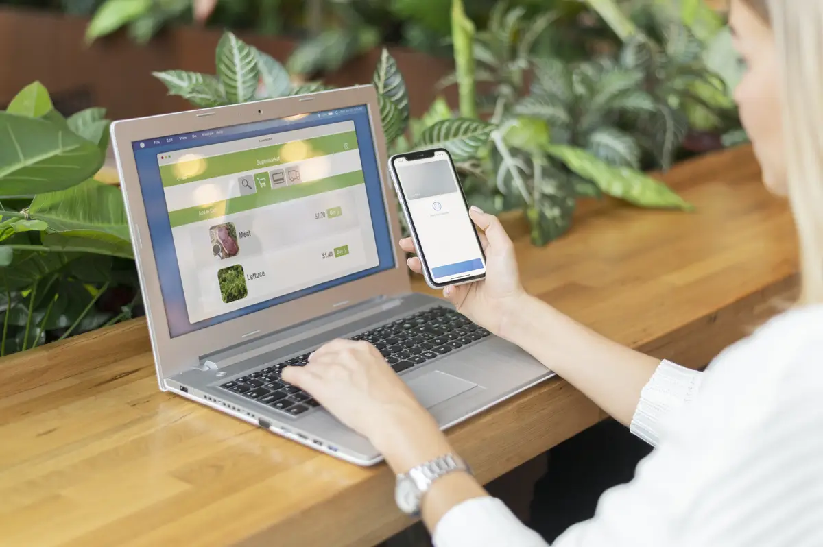 Person paying with its smartphone wallet app