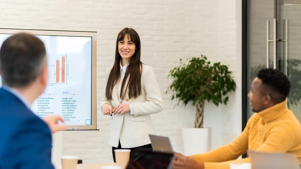Female team leader at business meeting in an office
