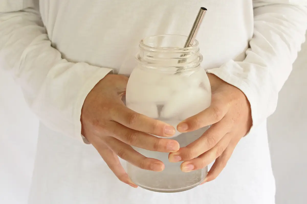 Midsection of woman holding ice cream