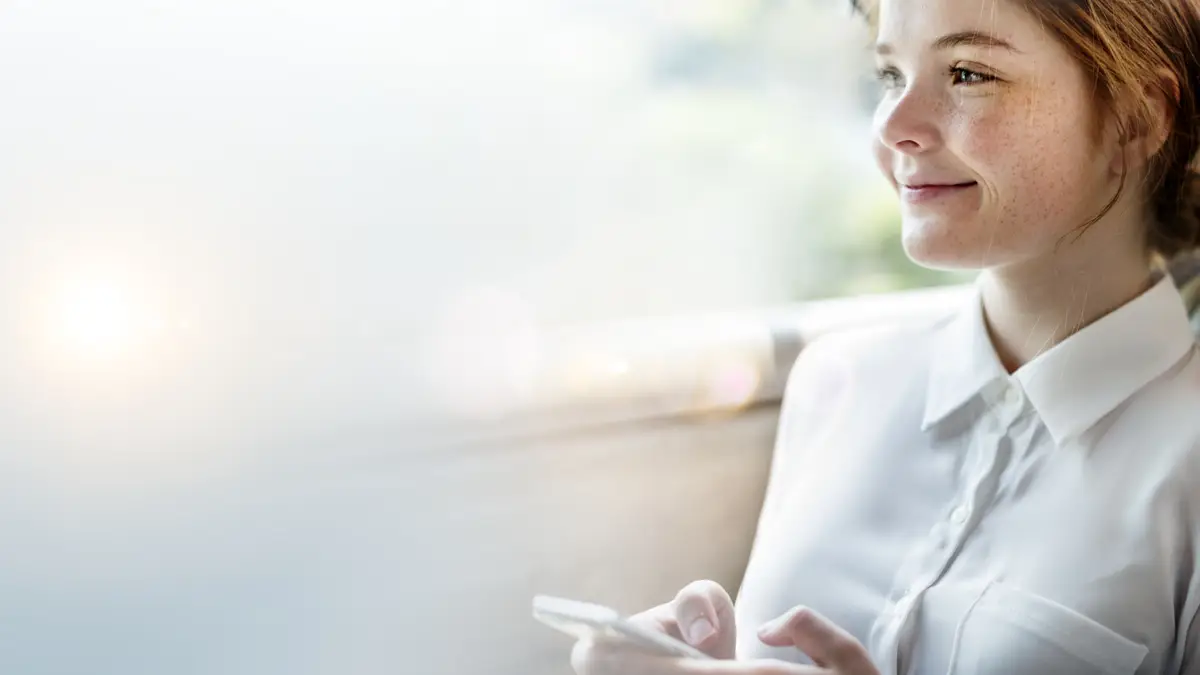 Young girl using her phone