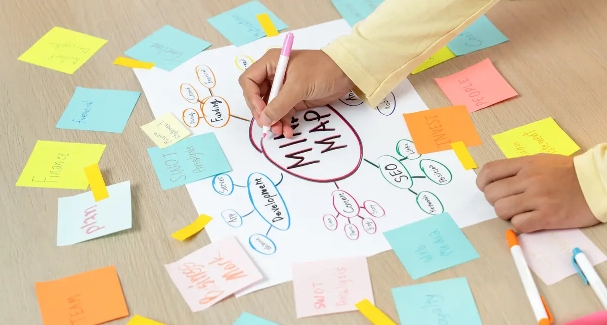 Professional startup group share marketing idea by using mind map variegated