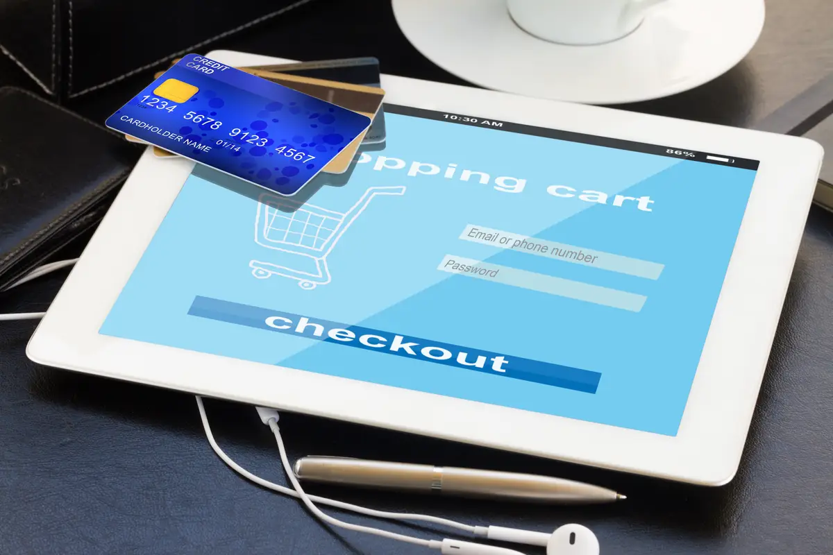 Mobile shopping  - checking out in virtual shop on tablet PC