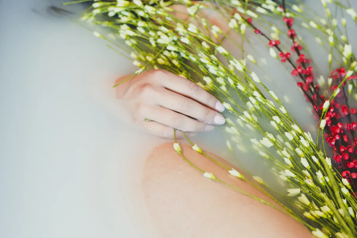 Flowers and woman in water