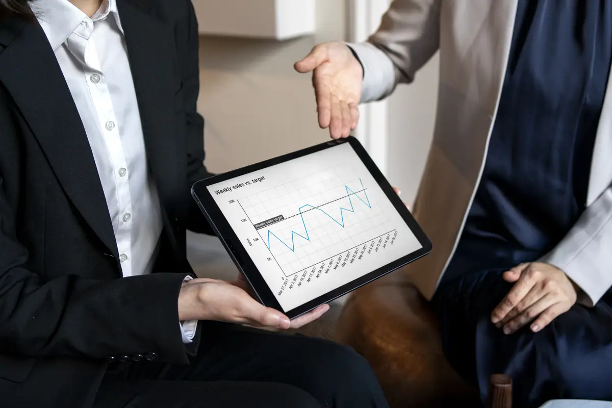 Business people working with ipad high angle