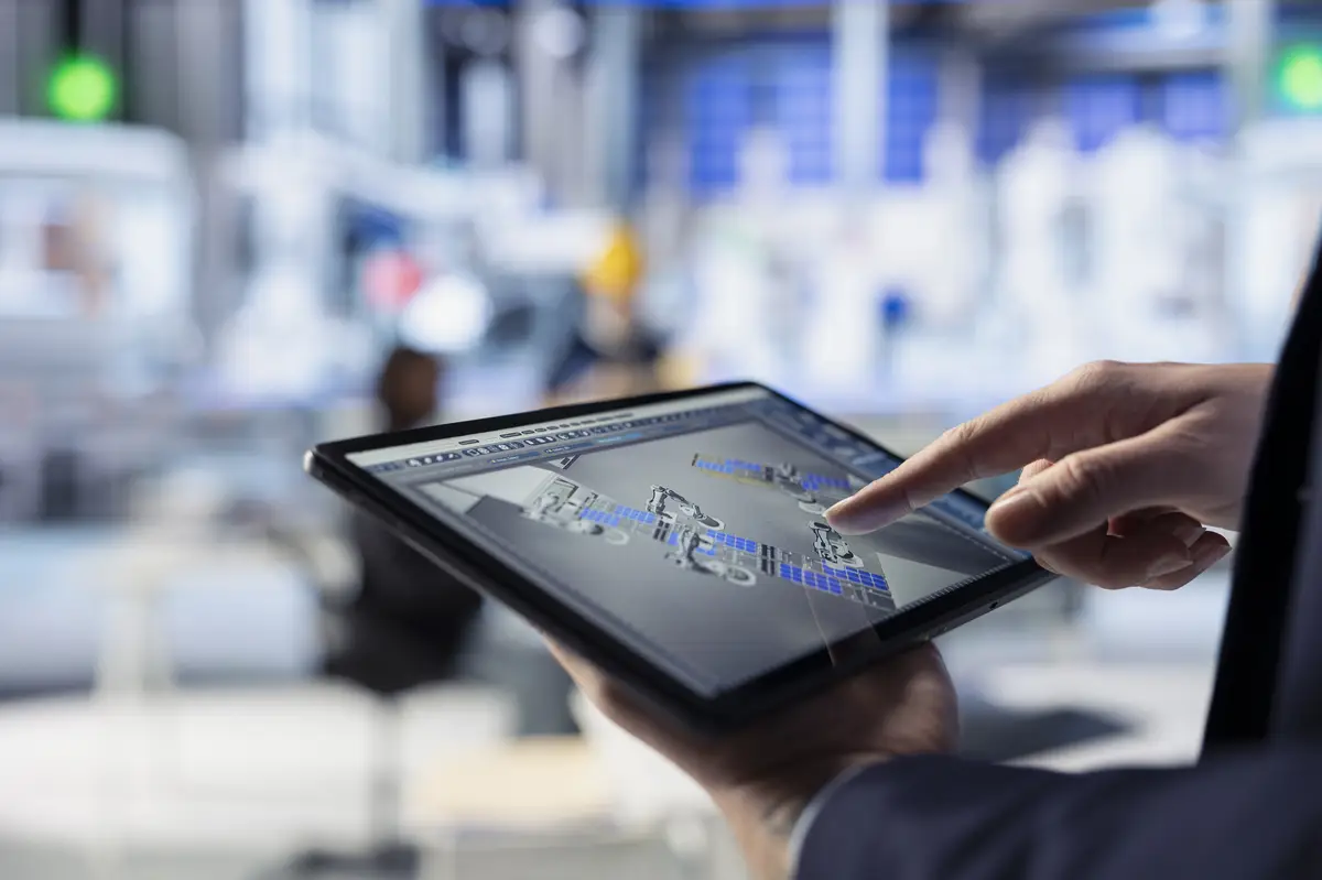 Specialist uses device to inspect solar plant machinery closeup