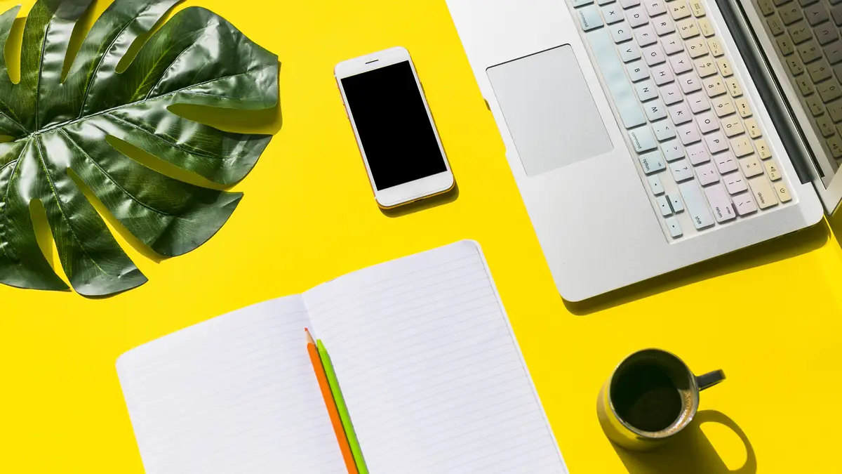 Office desktop with mobile phone