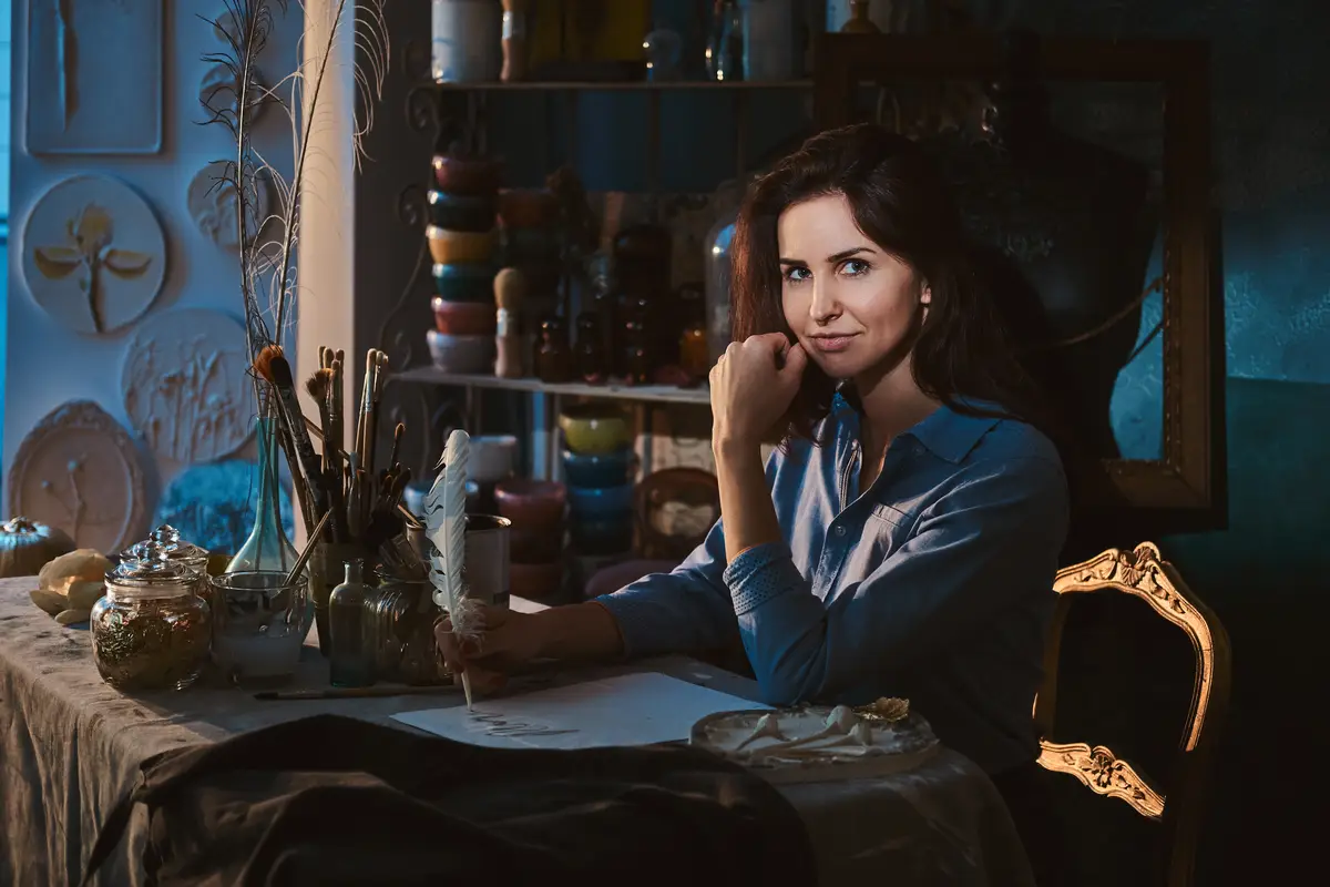 In the creative workshop young talented woman is working on her new project.