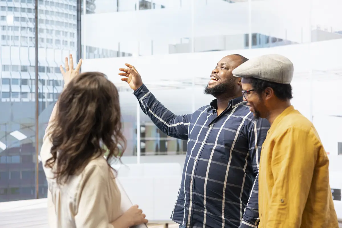 Clients and realtor touring a new high class office space