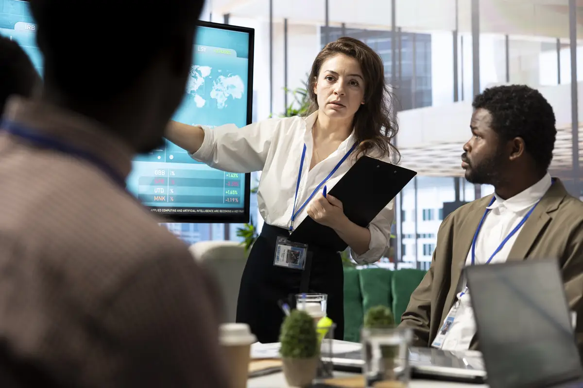 Corporate associates looking into project details and timetables