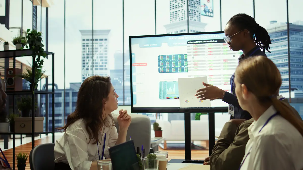 Employees team analyzing infographics to offer solutions for the new project