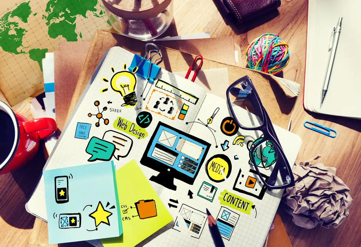 Aerial view of website content layout design illustration on notebook