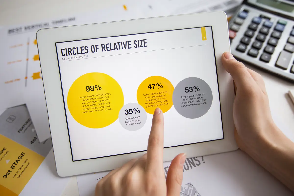 Close-up of touchpad in hands of female manager