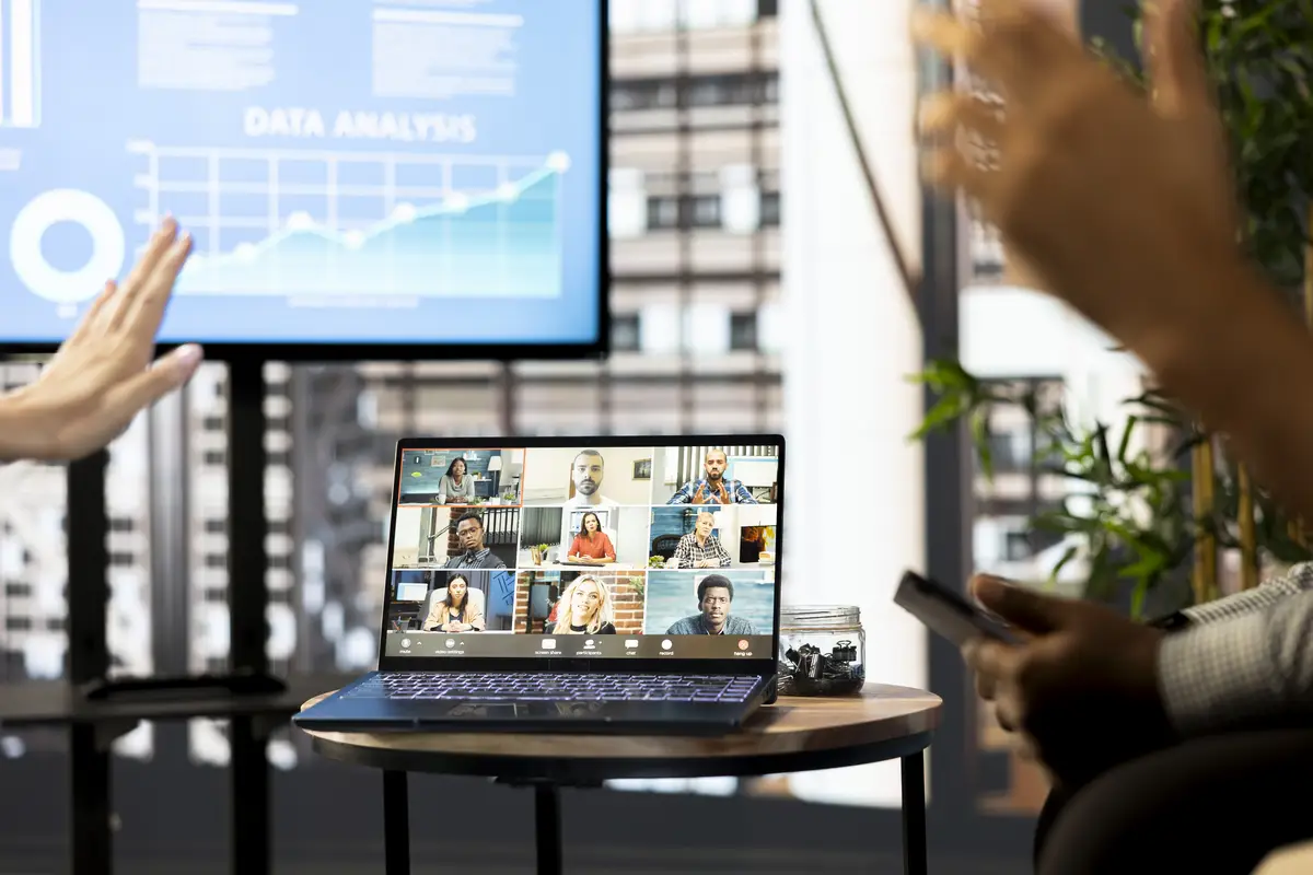 Specialists saluting manager on videocall attending briefing meeting