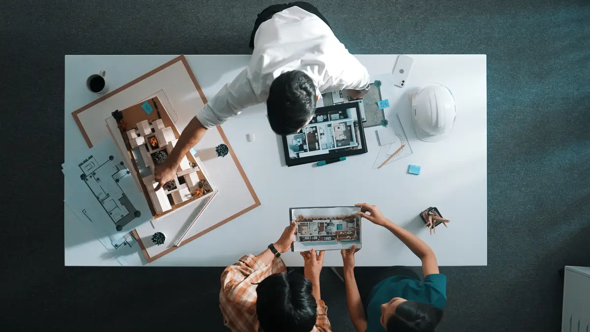 Top view of engineer looking tablet and planning building design Alimentation