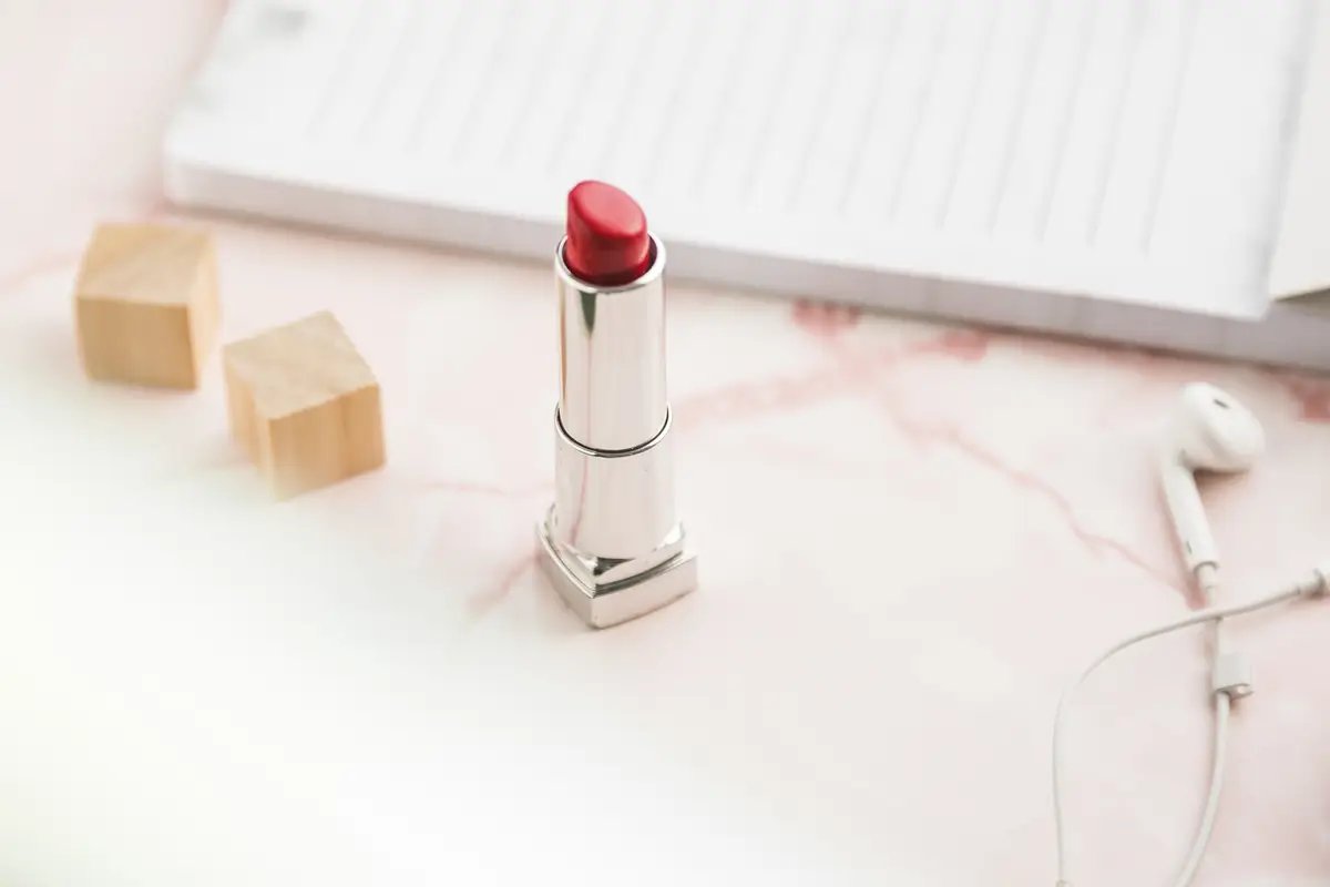 Office desktop with a lipstick
