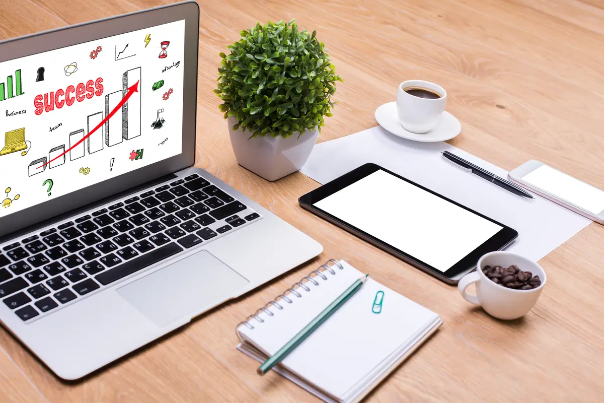 Laptop with success sketch