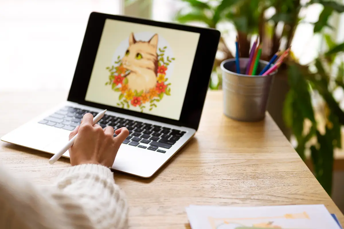 Creative illustrator working on devices