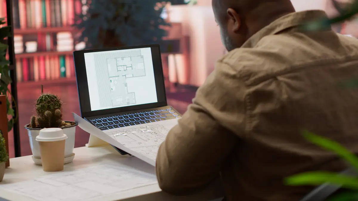 Business owner conducts strategic research on office spaces and building layouts