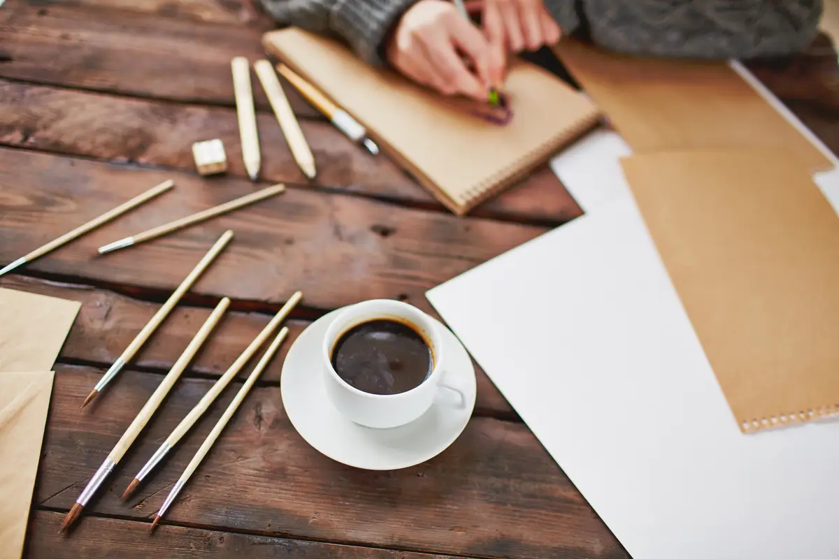 Close-up of a cup of coffee on wooden table