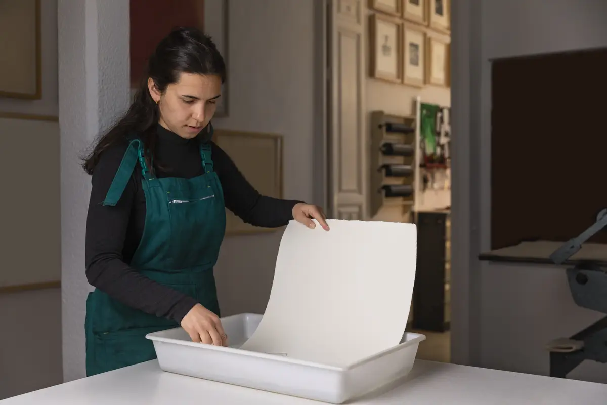 Close up on person working on engraving
