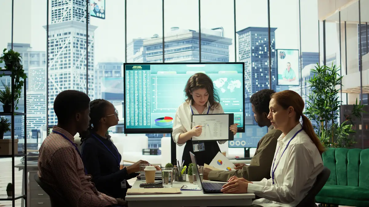Business associates reviewing key performance indicators within the enterprise