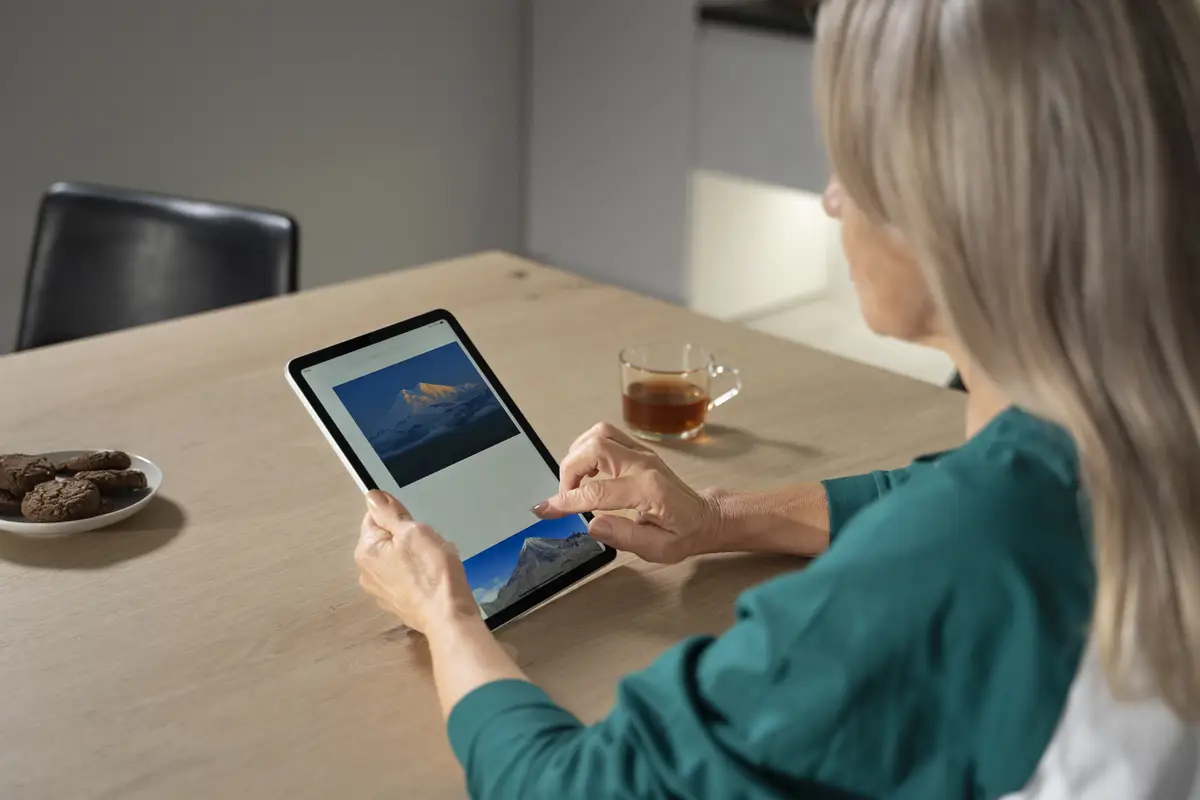 Elderly person using digital device