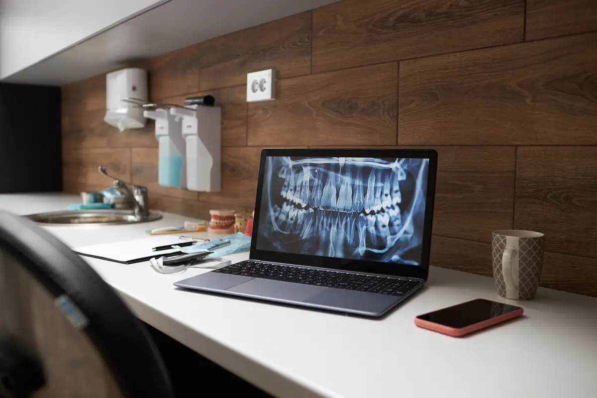 Displaying Dental XRay Image on Laptop in Modern Clinic