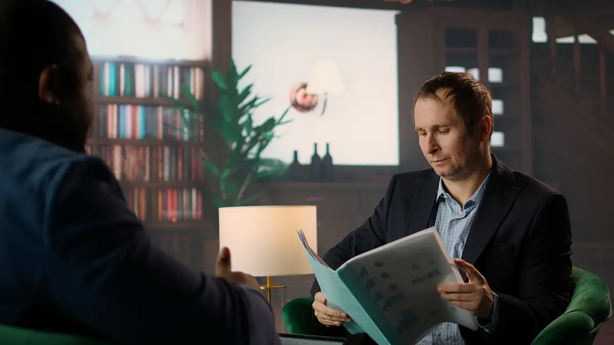Diverse secret service duo in CIA library lounge reviewing strategic information