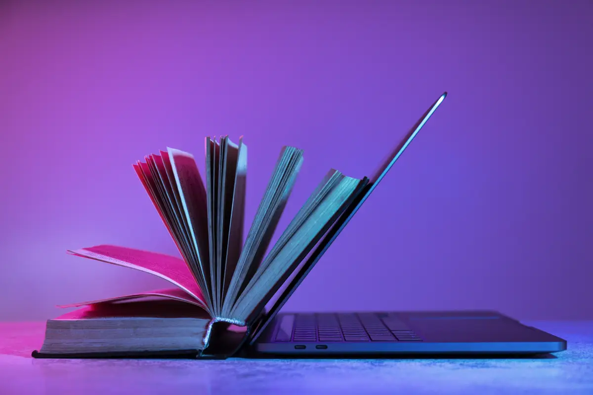 Still life of books versus technology