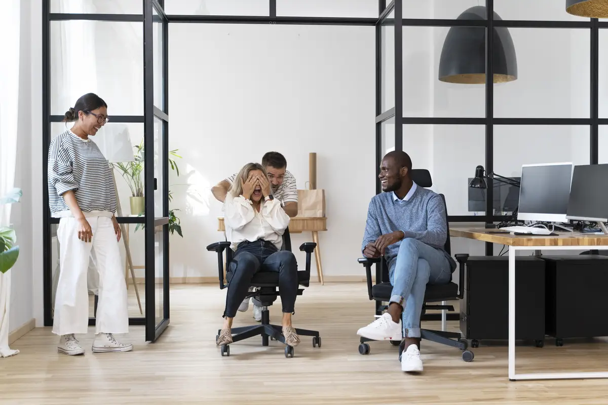 Young people having fun in work break