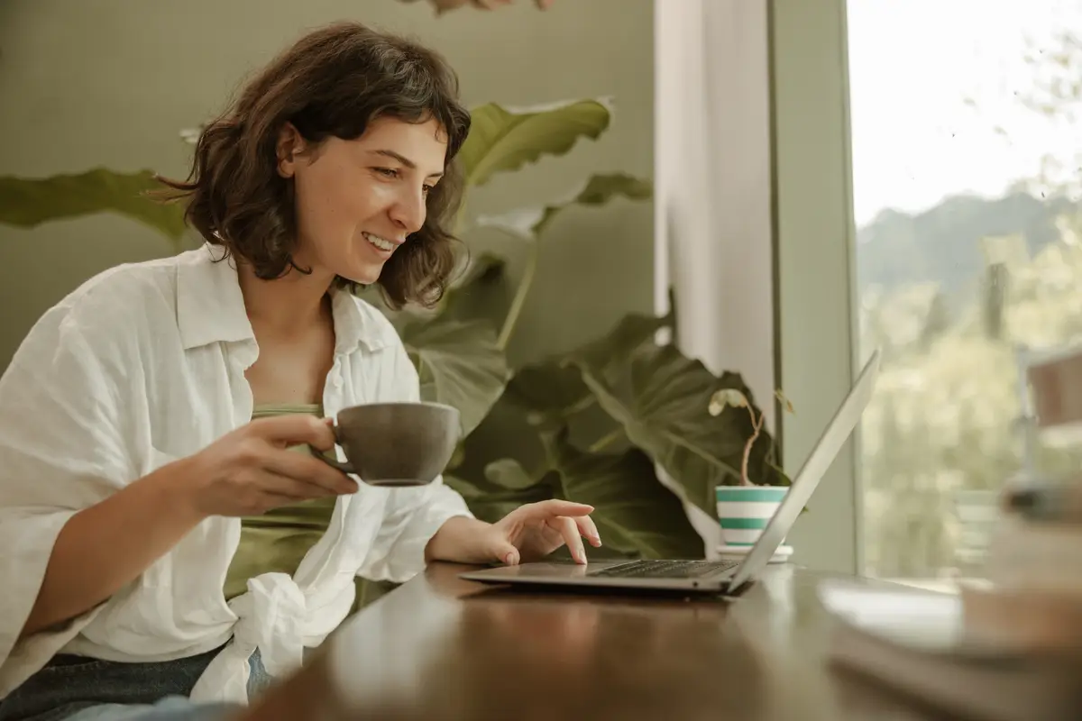 View of cute woman talking in cafe