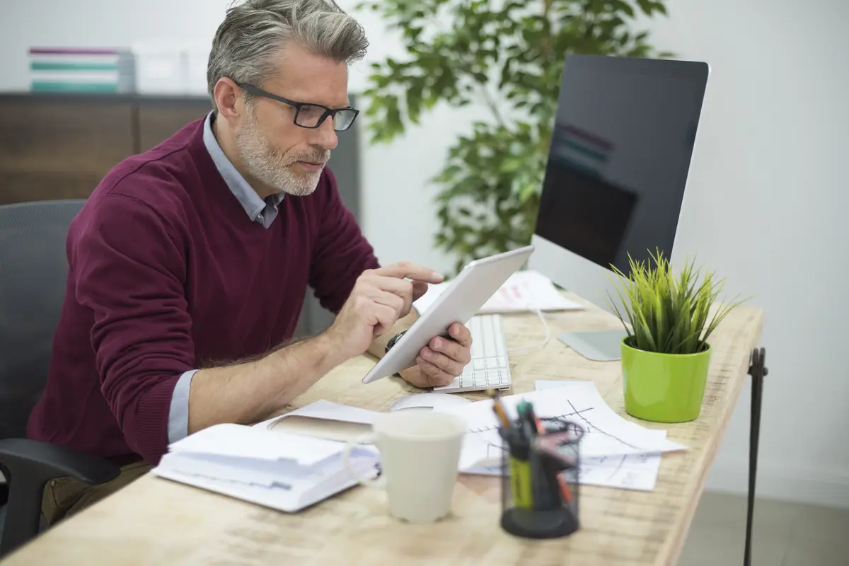 Man using wireless Internet at the office