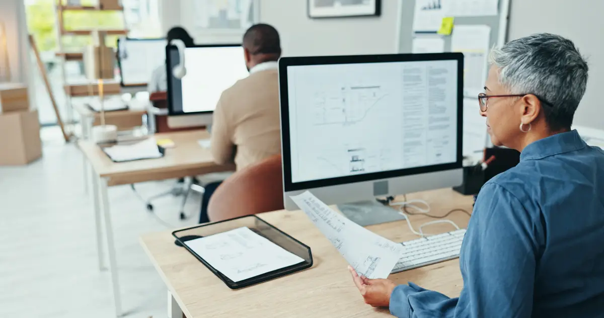 Architect computer screen and employee in office documents and planning for design blueprint and online Digital display and review of floor plan for architecture process and sketch for project