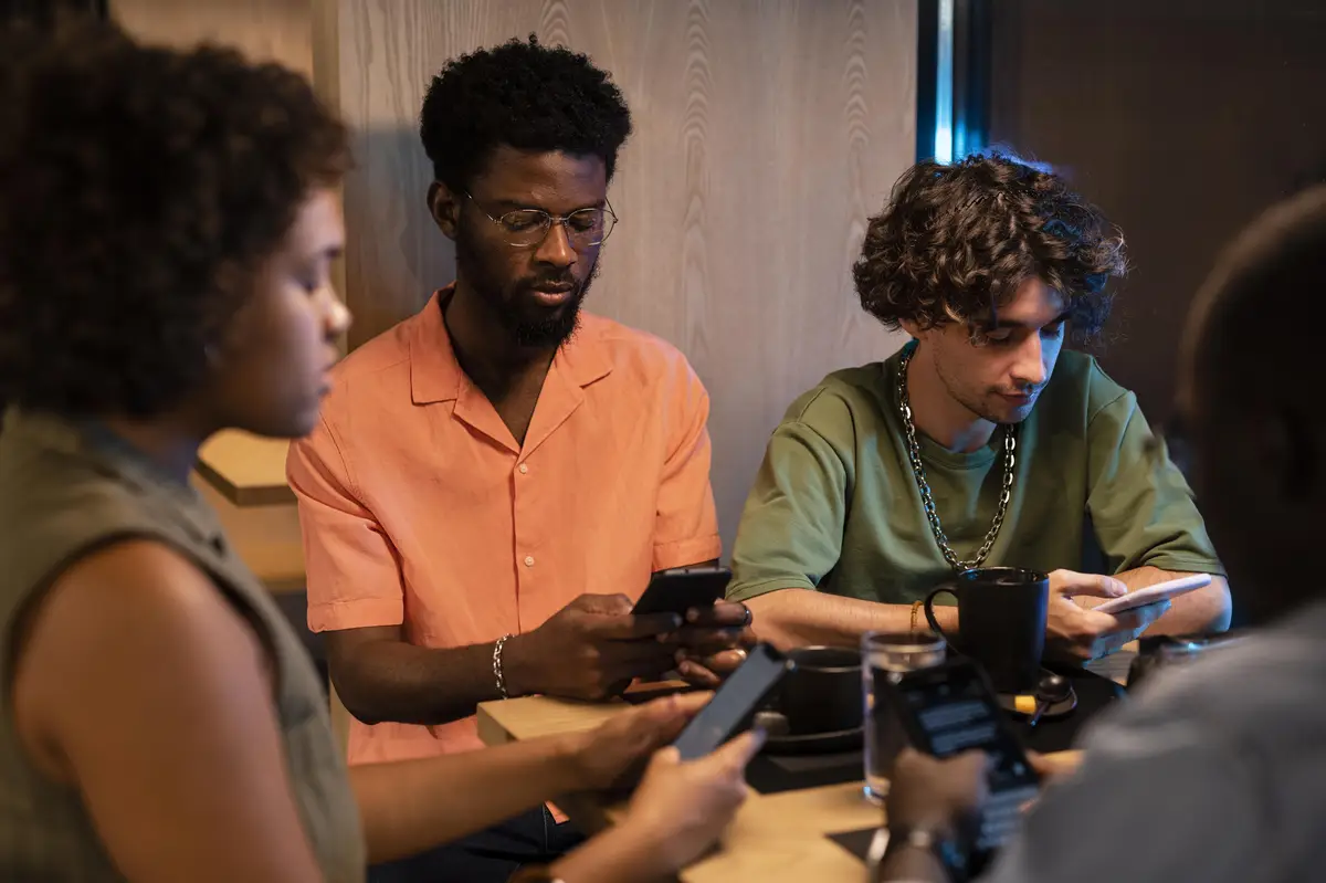 Close up friends with smartphones