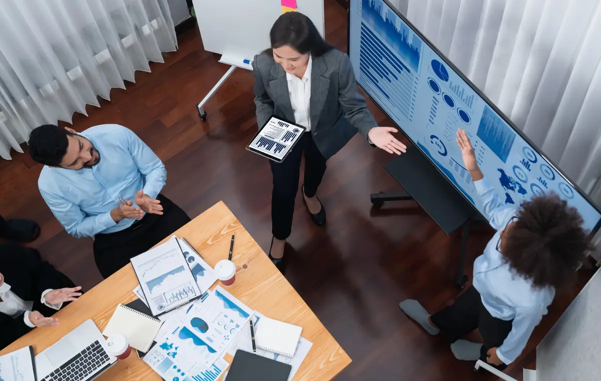 Top view business presentation with data analysis dashboard on TV Concord