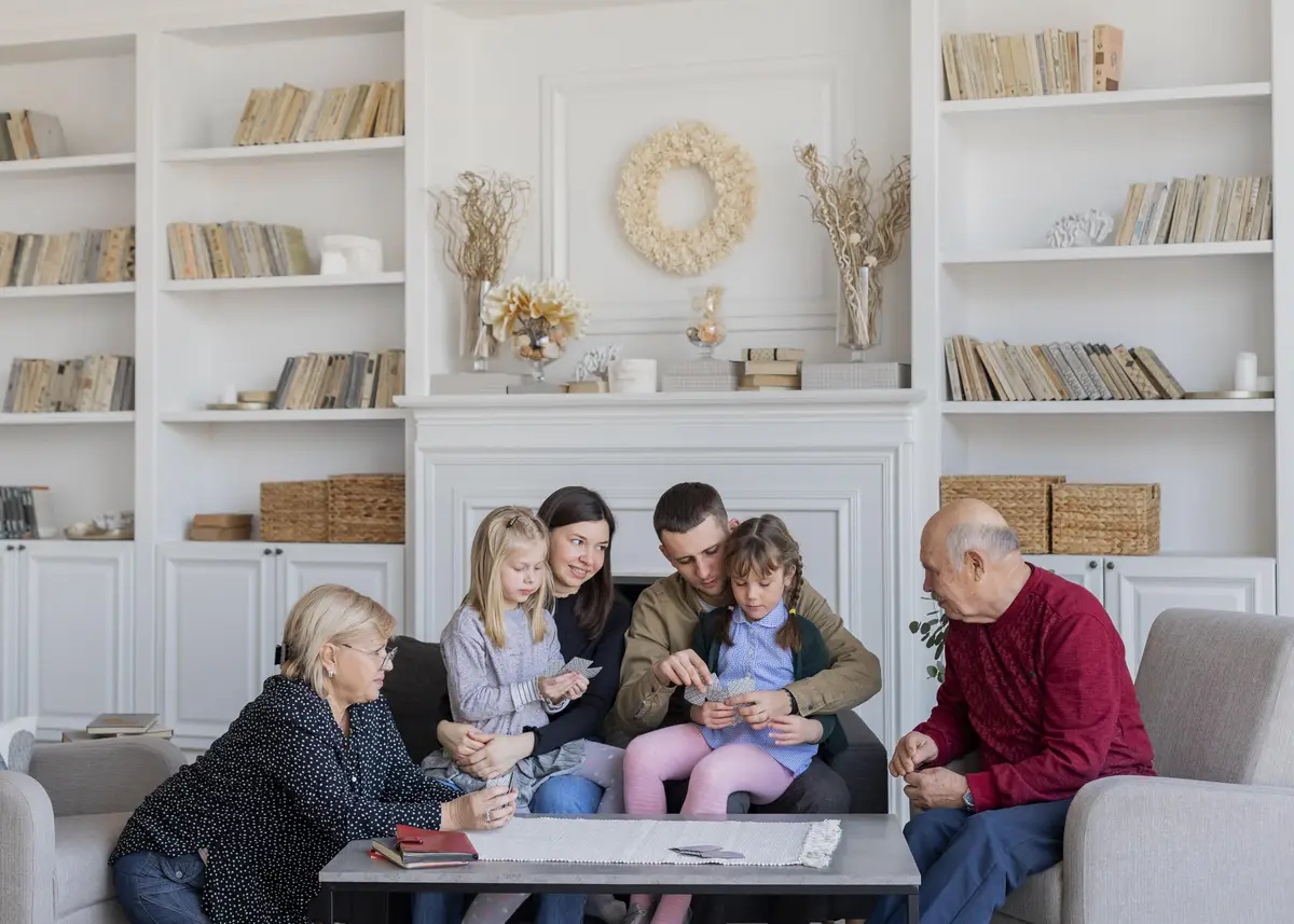 Medium shot family members sitting together