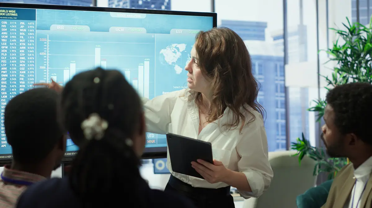 Advisory board members meeting in boardroom to establish future development plan