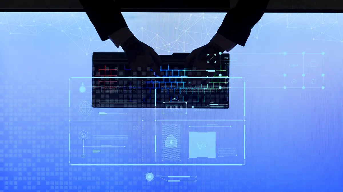 Businessman typing on a wireless keyboard