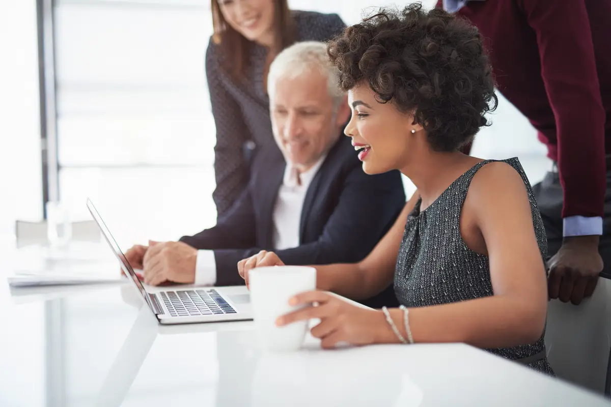 Partnership research and team director planning project with laptop discussion and ideas Brainstorming diversity and business people for negotiation work or presentation in meeting in office