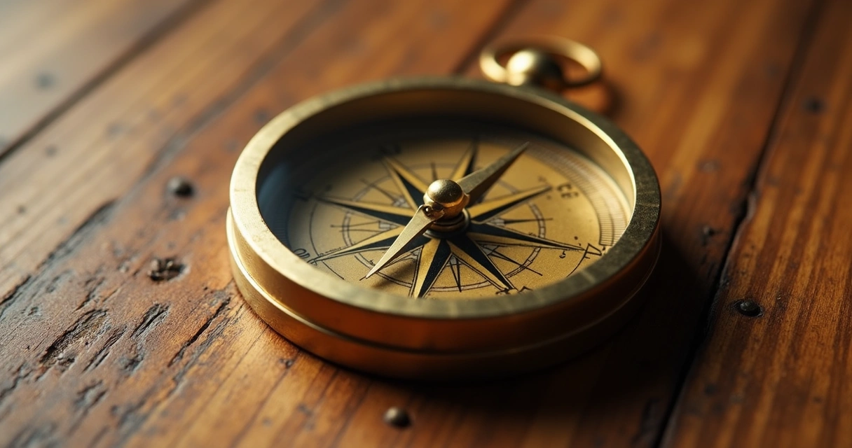 Bússola dourada sobre mesa de madeira indicando direção 