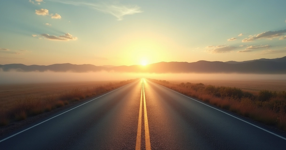Estrada dividida ao amanhecer em paisagem aberta