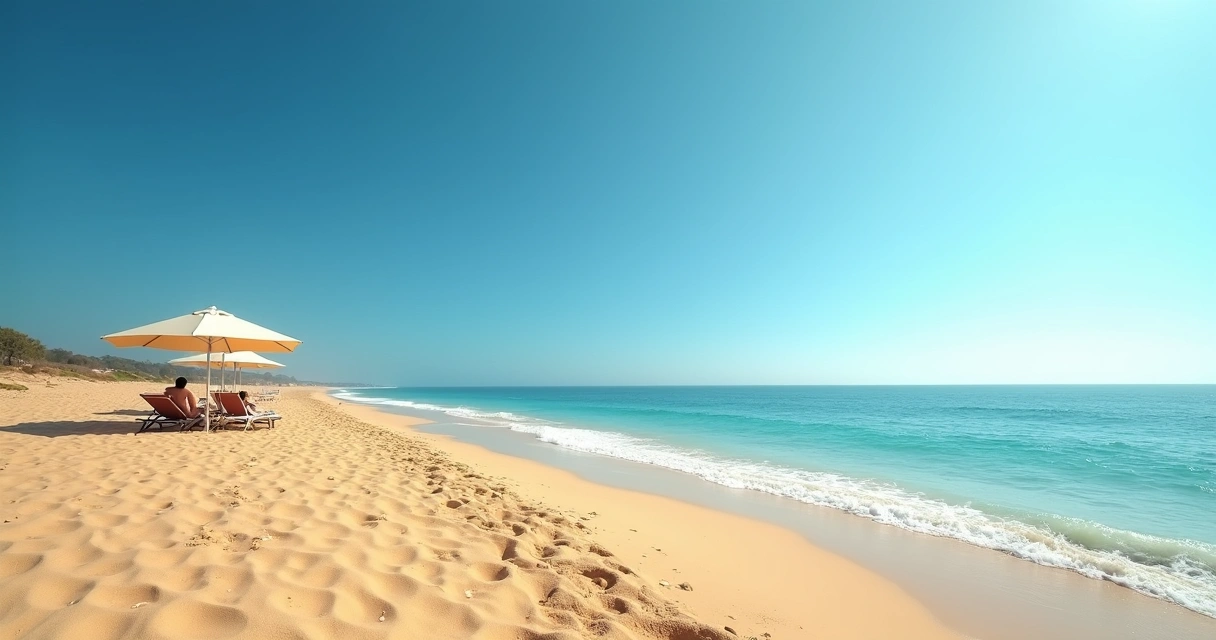 Praia tranquila com poucas pessoas e céu azul durante feriado 