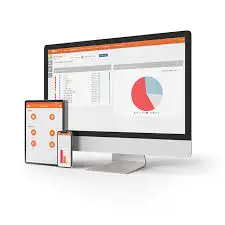 Tela de computador e smartphone exibindo gráficos e painéis de controle de sistema de ponto de venda