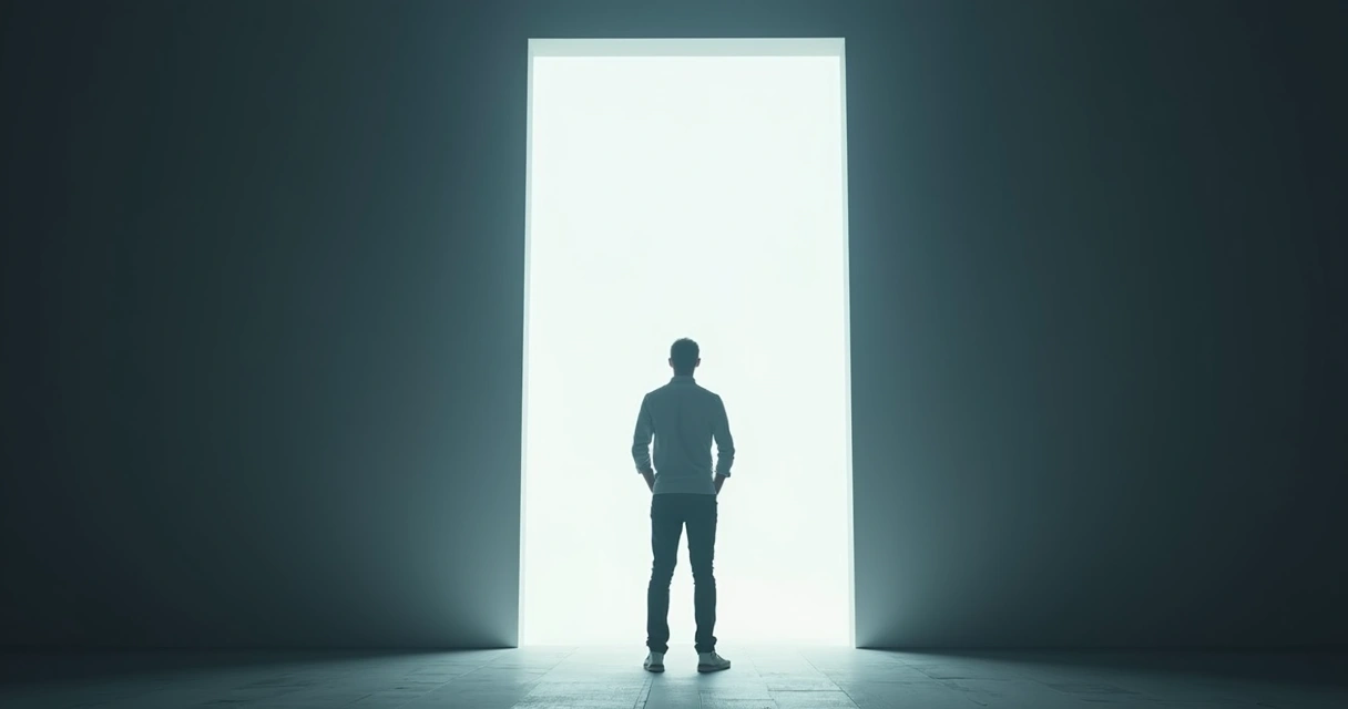 Person stands at the edge of a bright doorway, intense light casting dramatic shadows behind them 